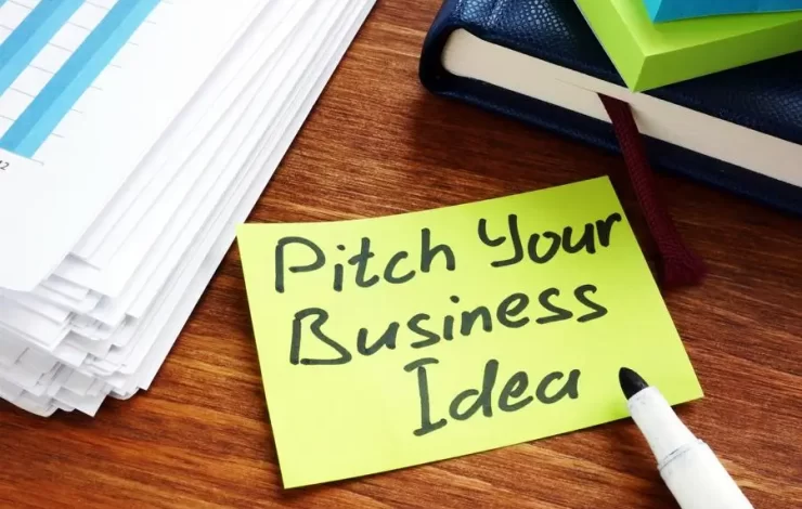 Ein Post-it mit der Beschriftung: "Pitche deine Geschäftsidee."