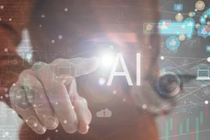 Eine Person interagiert mit einem KI-Symbol auf einem Computerbildschirm.